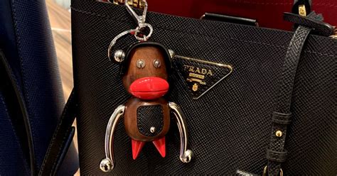 prada keychain sambo|Prada pulls products after accusations of blackface imagery.